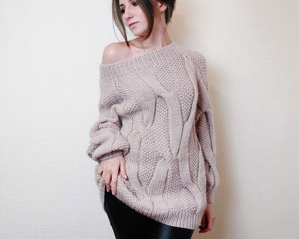 Бежевий жіночий светр-сукня з коса