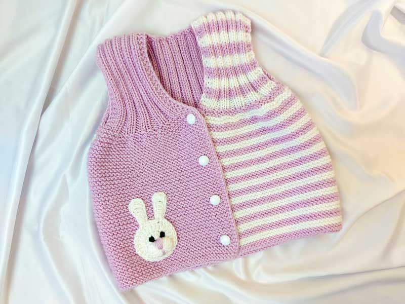 В'язана дитяча жилетка для дівчинки рожевого кольору