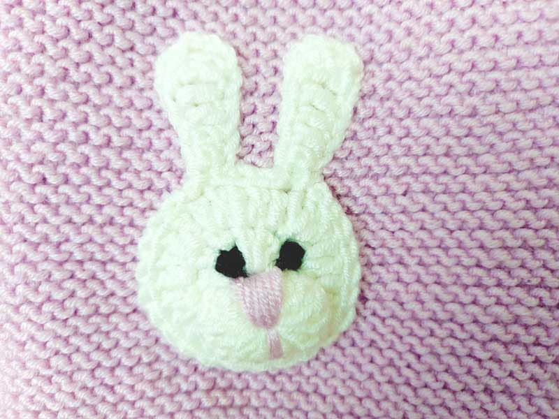 В'язана дитяча жилетка для дівчинки рожевого кольору